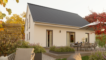 Modernes Einfamilienhaus mit Satteldach und Terrasse im herbstlichen Garten