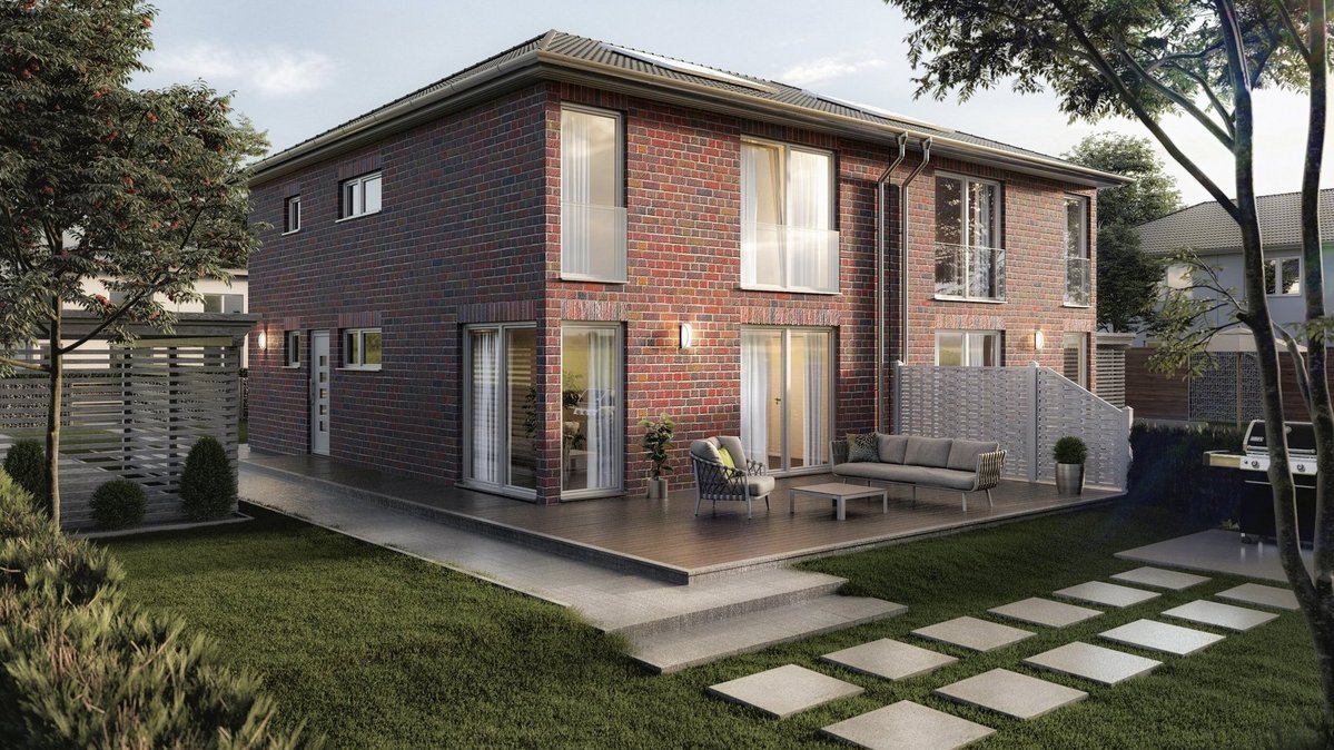 Zweigeschossiges Wohnhaus mit roter Klinkerfassade, Terrasse und Garten