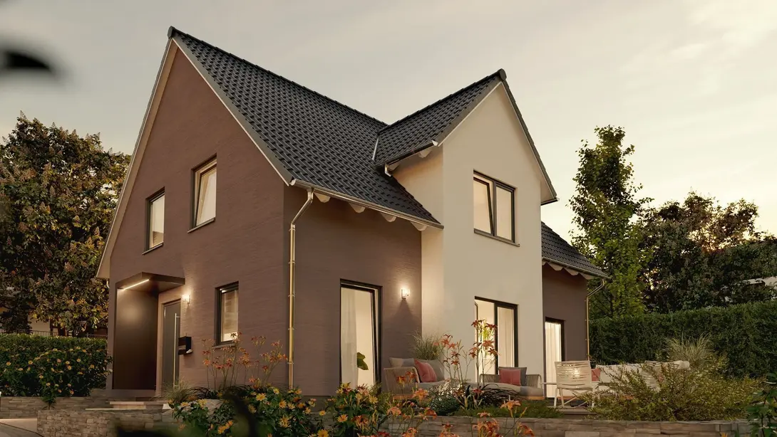 Modernes Einfamilienhaus mit zweifarbiger Fassade Modernes Einfamilienhaus mit Satteldach, zweifarbiger Fassade und Gartenterrasse