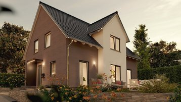 Modernes Einfamilienhaus mit Satteldach Modernes Einfamilienhaus mit dunkler Fassade und Satteldach im Abendlicht