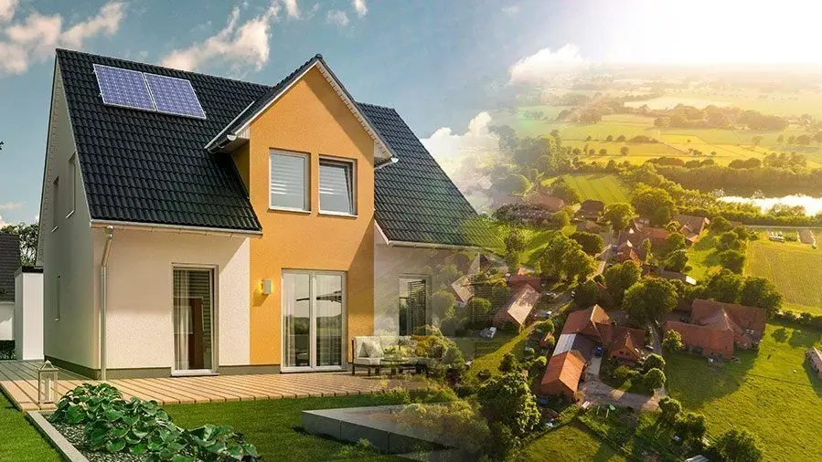 Energieeffizient bauen in Brandenburg Modernes Einfamilienhaus mit Photovoltaikanlage vor ländlicher Umgebung in Brandenburg.
