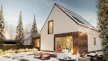Modernes Einfamilienhaus mit Satteldach, Holzfassade und Photovoltaikanlage im Winter