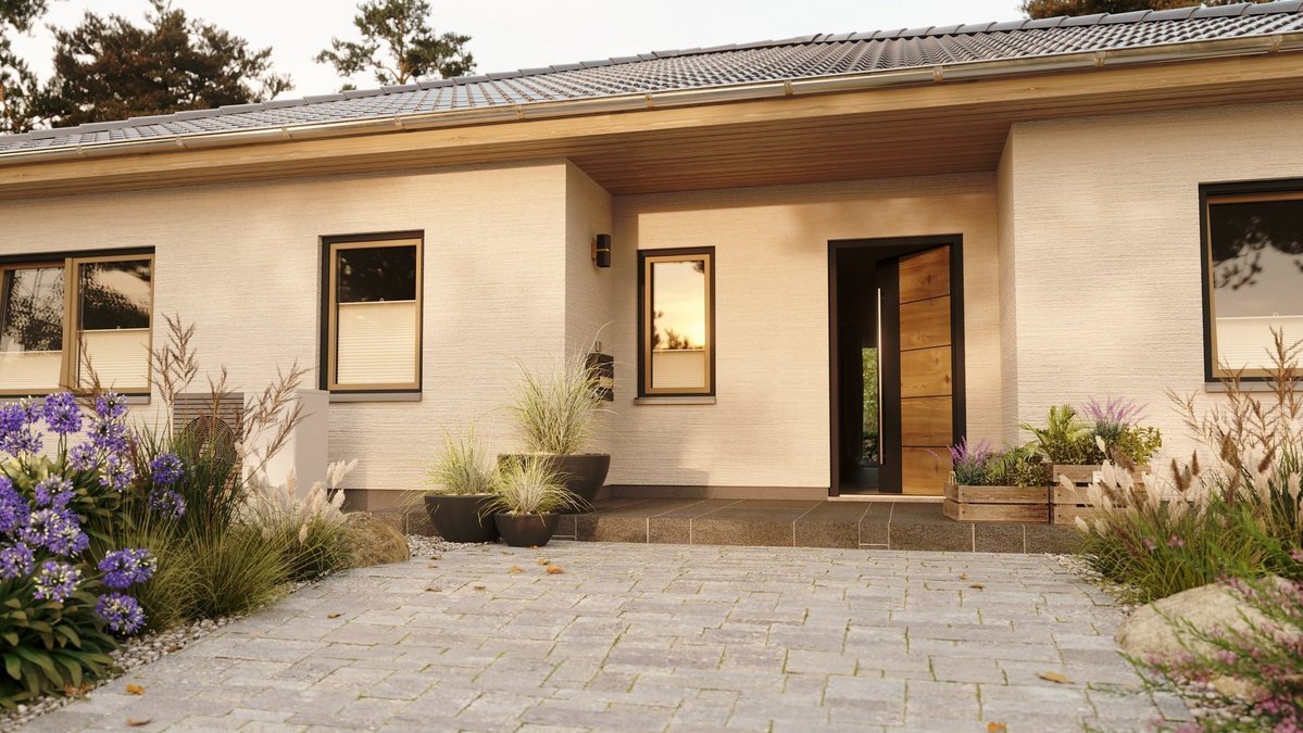 Moderner Bungalow mit überdachtem Eingangsbereich und bepflanztem Vorgarten