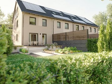 Modernes Reihenhaus mit Photovoltaik und Garten Modernes Reihenhaus mit Photovoltaikanlage, Terrasse und Garten in grüner Wohnlage.