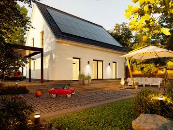 Das Einfamlilienhaus Edition 138+ mit Blick auf den Garten und PV-Anlage