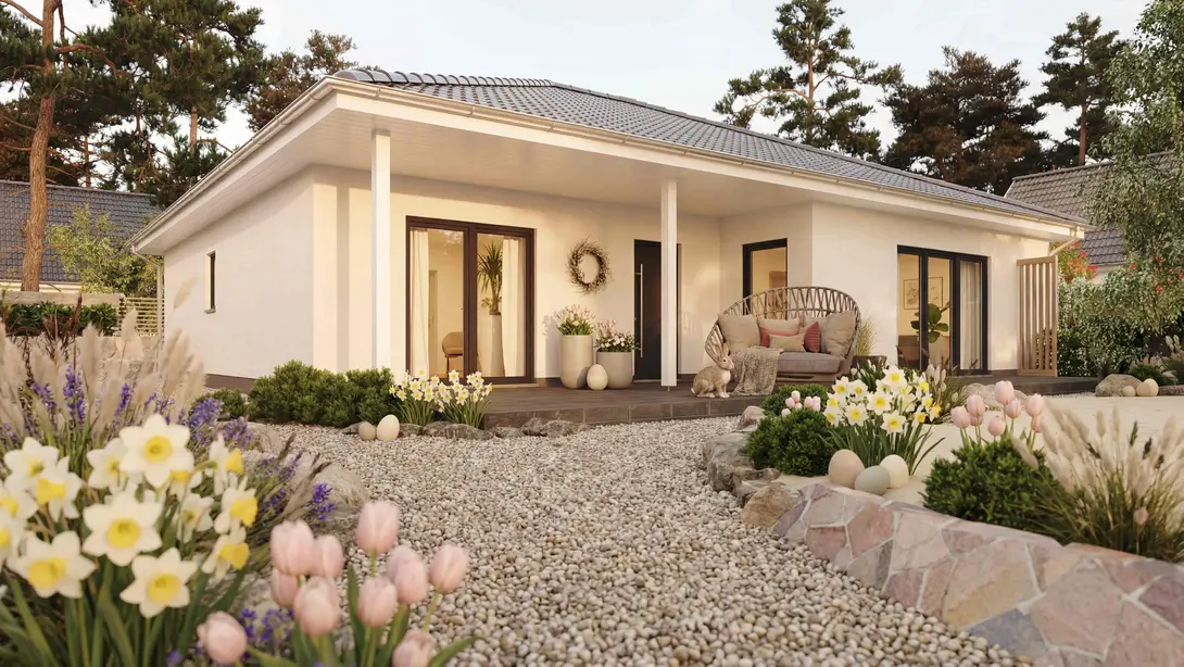 Moderner Bungalow mit Terrasse und Vorgarten Moderner Bungalow mit überdachter Terrasse, Kiesgarten und blühender Bepflanzung.