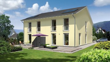 Modernes Mehrfamilienhaus mit Solardach und Garten Modernes Mehrfamilienhaus mit Satteldach, Solarmodulen, Terrasse und großem Garten.