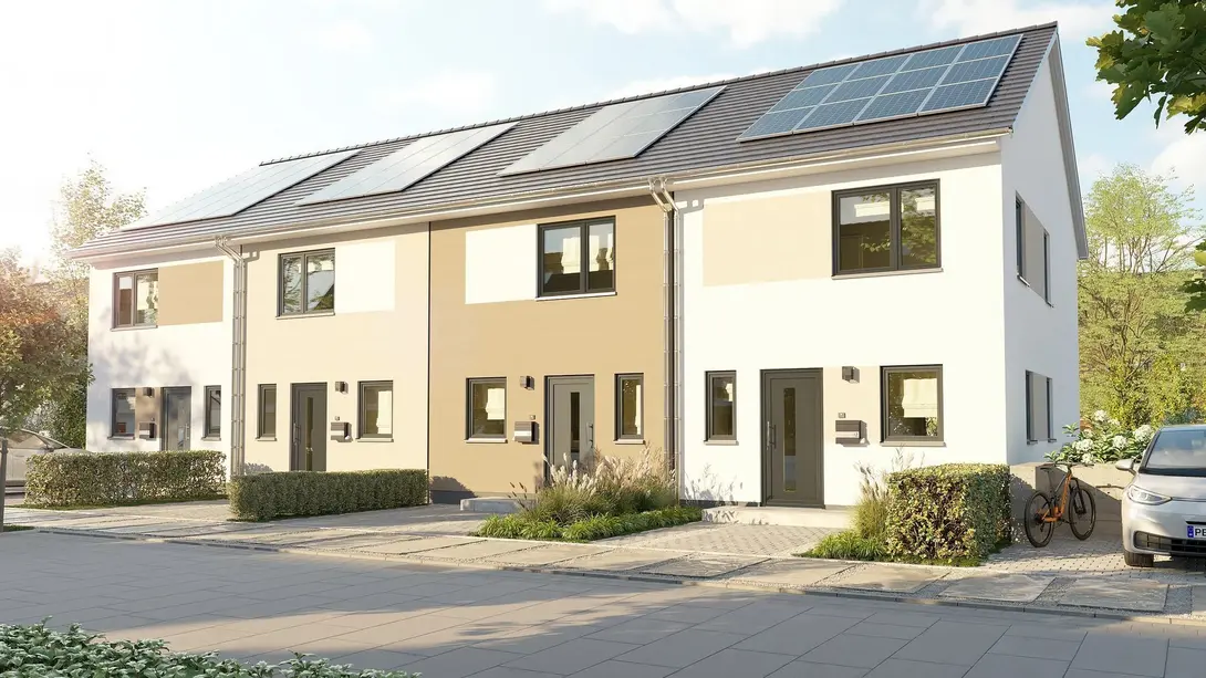 Moderne Reihenhäuser mit Satteldach und Photovoltaikanlagen